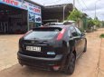 Ford Focus 2009 - Cần bán xe Ford Focus sản xuất 2009, màu đen xe gia đình, 299tr