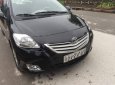 Toyota Vios 1.5 MT 2011 - Bán Toyota Vios 1.5 MT 2011, màu đen chính chủ, 309 triệu