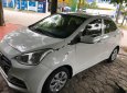 Hyundai Grand i10 2015 - Cần bán lại xe Hyundai Grand i10 2015, màu trắng, xe nhập  