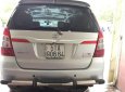 Toyota Innova 2.0E 2014 - Cần bán lại xe Toyota Innova 2.0E năm 2014, màu bạc  