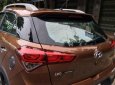 Hyundai i20 Active 1.4 AT 2015 - Cần bán xe Hyundai i20 Active 1.4 AT năm sản xuất 2015, màu nâu, xe nhập  