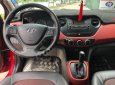 Hyundai Grand i10  1.2 AT 2015 - Bán xe Hyundai Grand i10 1.2 AT đời 2015, màu đỏ, xe nhập  