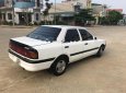 Mazda 323 1995 - Cần bán gấp Mazda 323 đời 1995, màu trắng, nhập khẩu giá cạnh tranh