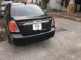 Daewoo Lacetti 2005 - Cần bán Daewoo Lacetti sản xuất năm 2005, màu đen