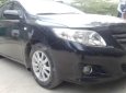 Toyota Corolla XLi 1.6 2009 - Cần bán xe Toyota Corolla XLi 1.6 năm sản xuất 2009, màu đen, xe nhập 