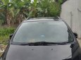 Mitsubishi Grandis 2.4 2006 - Bán Mitsubishi Grandis 2.4 đời 2006, màu đen, giá 310tr