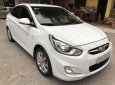 Hyundai Accent   1.4AT 2012 - Bán Hyundai Accent 1.4AT năm sản xuất 2012, màu trắng, xe nhập 