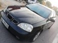 Daewoo Lacetti 1.8 MAX 2004 - Cần bán lại xe Daewoo Lacetti 1.8 MAX năm 2004, màu đen, xe nhập giá cạnh tranh