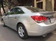 Chevrolet Cruze 2011 - Cần bán gấp Chevrolet Cruze 2011, màu bạc như mới