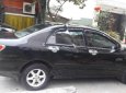 Toyota Corolla altis 2003 - Cần bán gấp Toyota Corolla altis đời 2003, màu đen chính chủ