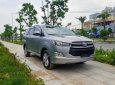 Toyota Innova E MT 2016 - Cần bán Toyota Innova E MT năm 2016, màu bạc