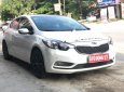 Kia K3 1.6 AT 2014 - Bán xe Kia K3 1.6 AT đời 2014, màu đen số tự động, giá tốt