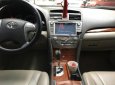 Toyota Camry 2.4G 2011 - Bán Toyota Camry 2.4G năm 2011, màu đen xe gia đình