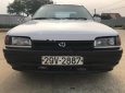 Mazda 323 1995 - Cần bán gấp Mazda 323 đời 1995, màu trắng, nhập khẩu giá cạnh tranh
