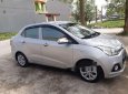 Hyundai Grand i10 2015 - Cần bán lại xe Hyundai Grand i10 đời 2015, màu bạc, xe nhập chính chủ