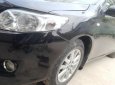 Toyota Corolla XLi 1.6 2009 - Cần bán xe Toyota Corolla XLi 1.6 năm sản xuất 2009, màu đen, xe nhập 