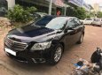 Toyota Camry 2.4G 2011 - Bán Toyota Camry 2.4G năm 2011, màu đen xe gia đình