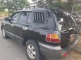 Hyundai Santa Fe 2004 - Bán xe Hyundai Santa Fe sản xuất 2004, màu đen chính chủ, 258 triệu