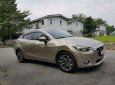 Mazda 2 2016 - Cần bán Mazda 2 2016, màu vàng cát