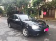 Daewoo Lacetti EX - 1.6L MT 2011 - Bán Daewoo Lacetti EX - 1.6L MT năm 2011, màu đen xe gia đình