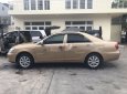 Toyota Camry 2002 - Cần bán xe Toyota Camry đời 2002, màu vàng cát