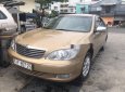 Toyota Camry 2002 - Cần bán xe Toyota Camry đời 2002, màu vàng cát