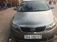 Kia Forte SLi 1.6 AT 2009 - Cần bán lại xe Kia Forte SLi 1.6 AT 2009, màu xám, nhập khẩu, 390 triệu