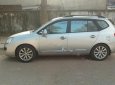 Kia Carens 2010 - Bán xe Kia Carens đời 2010, màu bạc