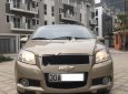 Chevrolet Aveo LT 1.5 MT 2014 - Cần bán gấp Chevrolet Aveo 1.5MT sản xuất 2014, màu vàng xe gia đình