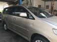 Toyota Innova E 2012 - Cần bán lại chiếc Toyota Innova E sản xuất 08/2012, màu nâu vàng