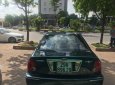 Ford Laser GHIA 1.8 MT 2003 - Bán lại xe Ford Laser GHIA 1.8 MT đời 2003, màu xanh lam