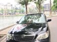 Toyota Camry 2003 - Bán Toyota Camry đời 2003, màu đen xe gia đình, giá chỉ 310 triệu