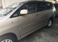 Toyota Innova E 2012 - Cần bán lại chiếc Toyota Innova E sản xuất 08/2012, màu nâu vàng