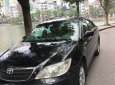 Toyota Camry 2003 - Bán Toyota Camry đời 2003, màu đen xe gia đình, giá chỉ 310 triệu