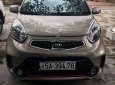 Kia Morning 2015 - Cần bán lại xe Kia Morning sản xuất năm 2015, màu vàng