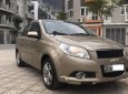 Chevrolet Aveo LT 1.5 MT 2014 - Cần bán gấp Chevrolet Aveo 1.5MT sản xuất 2014, màu vàng xe gia đình