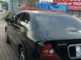 Daewoo Magnus 2004 - Cần bán gấp Daewoo Magnus đời 2004, màu đen chính chủ