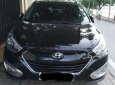 Hyundai Tucson 2.0 AT 2014 - Bán Hyundai Tucson 2.0 AT đời 2014, màu đen, nhập khẩu  