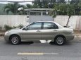 Mitsubishi Lancer 2003 - Gia đình bán lại xe Mitsubishi Lancer đời 2003, màu xám