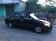 Toyota Corolla altis E  2009 - Bán Toyota Corolla Altis E sản xuất 2009, màu đen