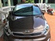 Kia Rio HB 2015 - Cần bán xe Kia Rio HB đời 2015, màu nâu, xe nhập