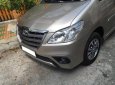 Toyota Innova E 2015 - Cần bán lại xe Toyota Innova E đời 2015, màu vàng