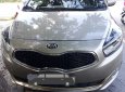 Kia Rondo 2016 - Gia đình cần bán Kia Rondo 2016, số tự động, màu vàng cát, bản mâm mới