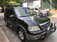 Ford Escape    XLT AT 3.0  2005 - Bán chiếc xe Ford Escape XLT AT 3.0 2 cầu điện 4x4 số tự động đk 2005, màu đe