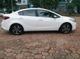 Kia Cerato 1.6 2018 - Bán xe Kia Cerato 1.6 AT màu trắng sản xuất 2018 đăng ký 04/2018