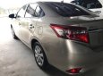 Toyota Vios E 2016 - Bán Toyota Vios E  số sàn đời 2016, màu nâu vàng, giá tốt