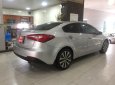 Kia K3 1.6MT 2014 - Bán Kia K3 1.6MT sản xuất 2014, màu bạc như mới