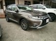 Mitsubishi Outlander CVT 2018 - Bán ô tô Mitsubishi Outlander 2.0 CVT đời 2018, màu Nâu, hỗ trợ trả góp 70% xe. Liên hệ 0911.821.514