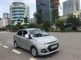 Hyundai Grand i10 2016 - Cần bán lại xe Hyundai Grand i10 sản xuất năm 2016, màu bạc, giá tốt