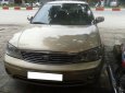 Ford Laser      1.8 MT 2005 - Gia đình cần bán Ford Laser 1.8 Sx 2005, số sàn, màu vàng cát còn mới